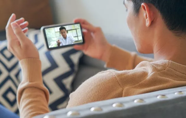 Person watching a video on a phone